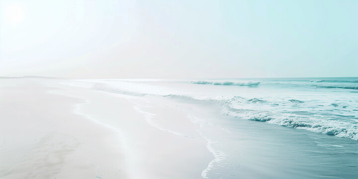 A serene beach with white sand and gentle waves lapping at the shore