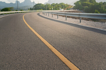 Roadside metal rail barrier structure which is installed on side of the road for protected the car...