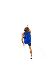 Young athletic man, runner in motion, training and reaching his athletic goals isolated on white studio background. Concept of sport, marathon, competition, healthy and active lifestyle