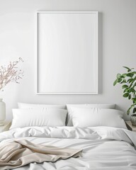 Cozy minimalistic bedroom with white bedding, blank picture frame on the wall, and plants adding a touch of nature for a serene atmosphere.