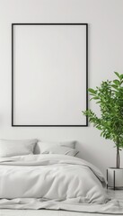 Minimalist bedroom with a blank vertical frame on white wall, cozy bedding, and green indoor plant, perfect for interior design inspiration.