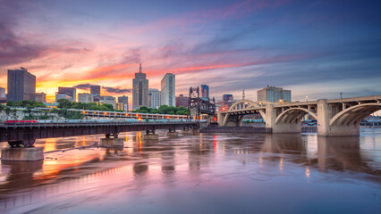 Saint Paul, Minnesota, USA. Cityscape image of downtown St. Paul, Minnesota, USA with reflection of the skyline in Mississippi River at beautiful summer sunset.