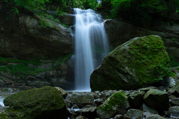 mustic waterfall  in the forest in long exposure 