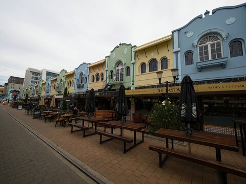 Christchurch, New Zealand: Colourful building facades in New Regent Street, Spanish Mission Revival architecture style