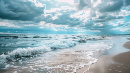 Tranquil beach scene with waves crashing onto shore under cloudy sky