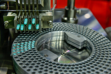 Capsule medicine pill production line, Industrial pharmaceutical concept.	