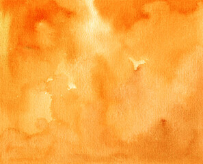 Naklejka premium Yellow - orange abstract watercolor wash. Hand painted textured background