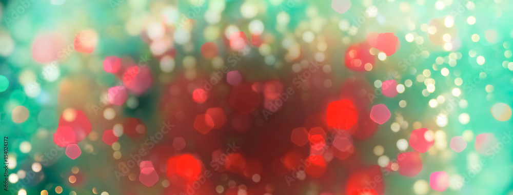 Wall mural abstract red and green bokeh background with blurred bokeh lights - christmas concept
