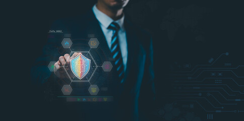 Cybersecurity: Analyzing Business Growth and Protection Measures. A businessman analyzes and ensures secure business growth, focusing on cybersecurity and protection measures.