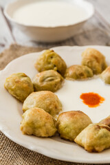 Bosnian pastry or manti served with yoghurt, a culinary delight from the Balkans.