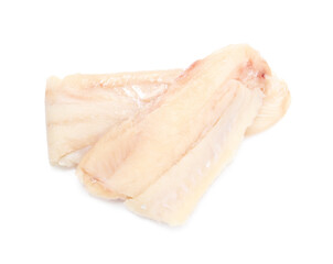 Pieces of raw cod fish isolated on white