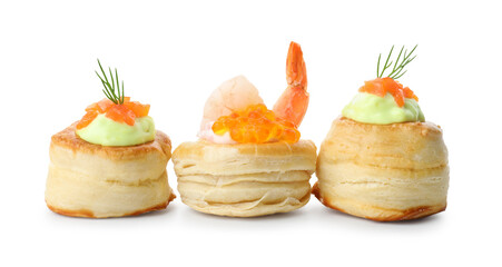 Different delicious puff pastry snacks isolated on white