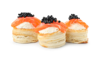 Delicious puff pastry with cream cheese, salmon and black caviar isolated on white