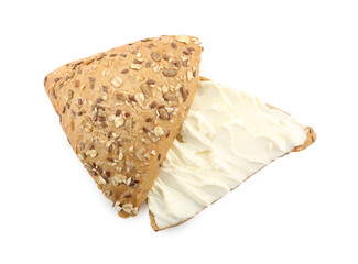 Pieces of bread with cream cheese isolated on white, top view
