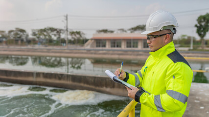 Environmental engineers work at wastewater treatment plants,Water supply engineering working at Water recycling plant for reuse