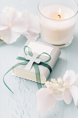 First holy communion or confirmation - candle, small present and flowers