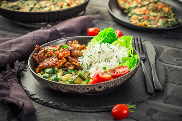 Ketogenic diet lunch bowl with grilled meat, grilled zucchini and grated white turnips