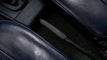 Handbrake handle in a car