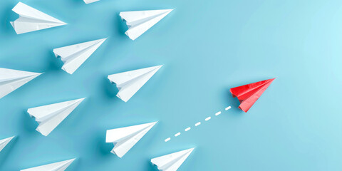 Solo red paper plane changing course