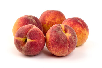 Fresh peaches, isolated on white background.