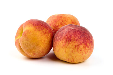 Fresh peaches, isolated on white background.