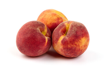Fresh peaches, isolated on white background.