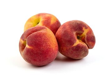Fresh peaches, isolated on white background.