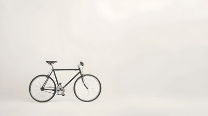 Fototapeta premium Minimalist Black Bicycle Studio White Background
