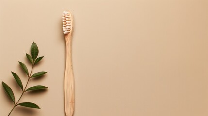 Eco friendly bamboo toothbrush on beige background with copy space