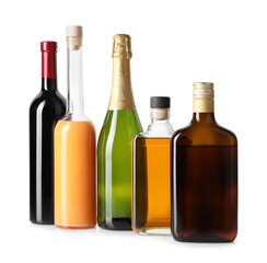 Bottles of different alcoholic drinks isolated on white