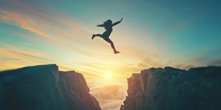 A person takes a leap of faith and jumps off a cliff, soaring through the air