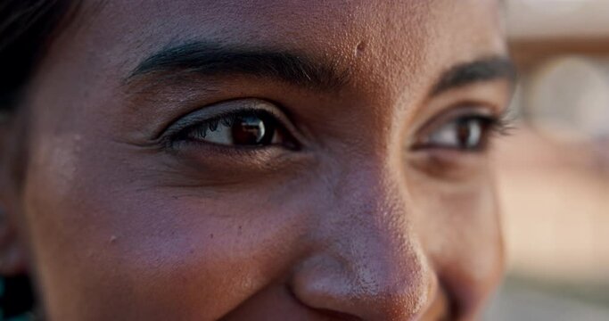 Woman, thinking and eyes with closeup outdoor in city for morning fresh air, vision and focus. Indian girl, person and face zoom in urban street with wondering, thoughtful and pride for eyesight