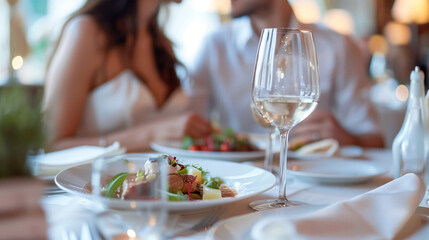 Obraz premium couple in an expensive restaurant in a restaurant in white colors 