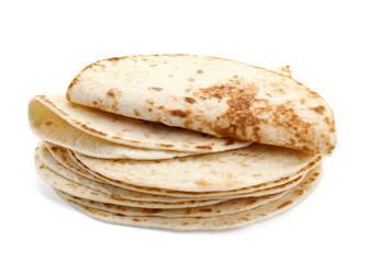 Many tasty homemade tortillas isolated on white