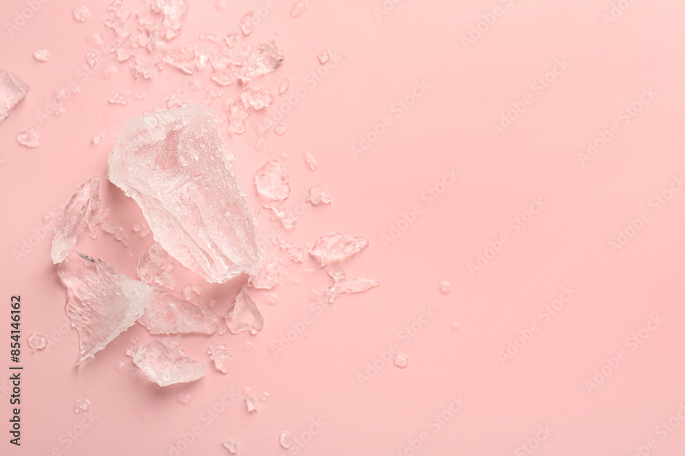 Poster Pieces of crushed ice on pink background, top view. Space for text