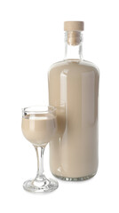 Bottle and glass of coffee cream liqueur isolated on white