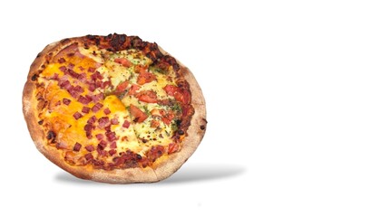 Top view of a delicious two-way pizza, one half with pesto sauce and the other half with ham and bacon, isolated on white background with space for text.