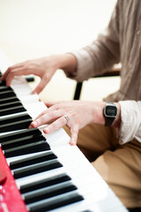 Fototapeta premium Music school. Playing the piano. Hands on keyboard