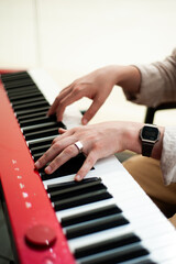 Obraz premium Music school. Playing the piano. Hands on keyboard