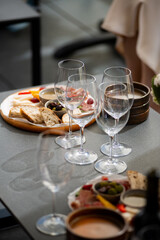 Wine tasting. Sommelier pours wine into a glass