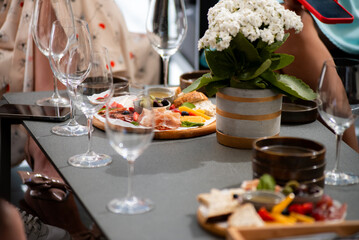 Wine tasting. Sommelier pours wine into a glass