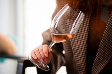 Wine tasting. Sommelier pours wine into a glass