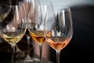 Wine tasting. Sommelier pours wine into a glass