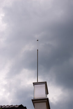 Lightning rod against stormy sky on a rainy day