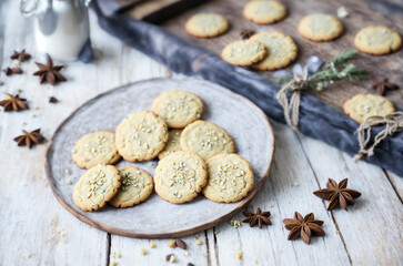 Fototapeta premium Beautiful traditional cookies on a wooden table - shabby chic - AI generated