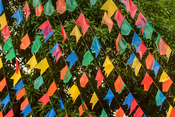 Colorful flags on the street for the São João festival, which takes place in June in northeastern...