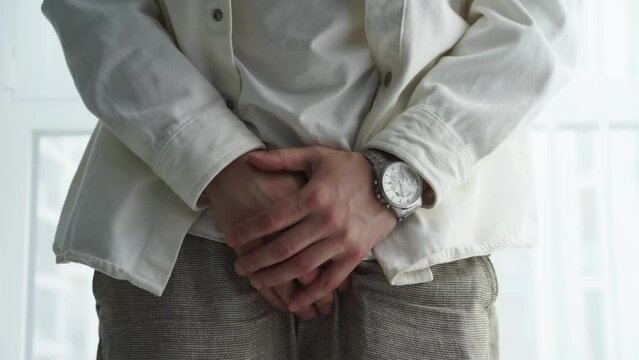 Man with urination problem.
Urinary incontinence in men.
The man wants to go to the toilet.
The man is in pain.
Male cystitis