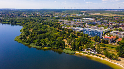.Aerial drone footage of a large, beautiful view of Senftenberg, a tourist town, sunny day.  beauty of German nature from air