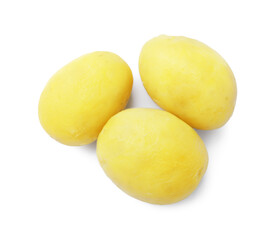 Three young boiled potatoes isolated on white, top view