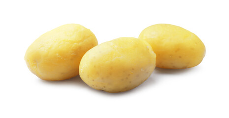 Three young boiled potatoes isolated on white